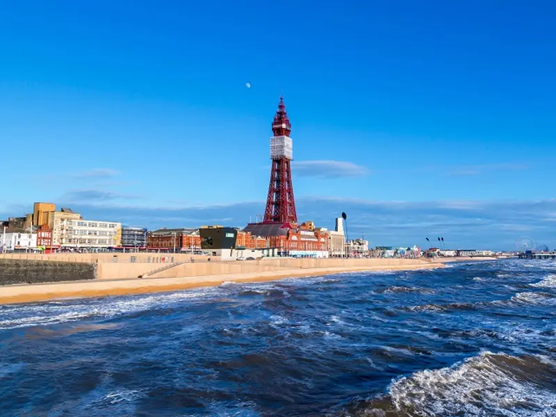 The iconic Blackpool Tower against a blue sky
