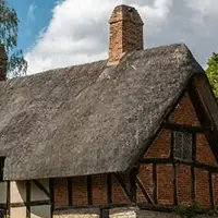 Cottage with a thick thatched roof