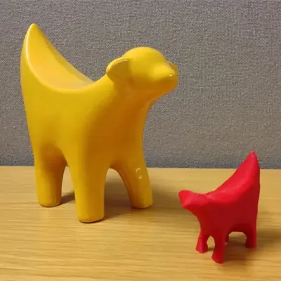 Small red and yellow Superlambanana figure