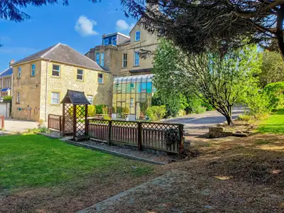 Wentworth House Hotel offering a quieter Bath stay with grounds, parking and a seasonal outdoor pool.