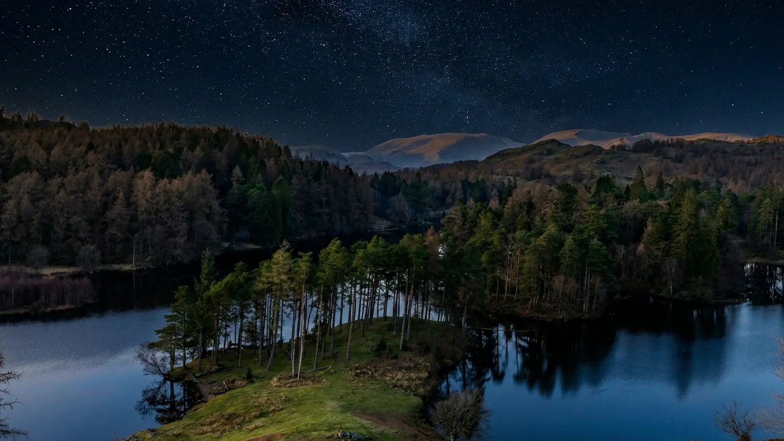 Tarn Hows Visitor Guide Banner featuring the stunning Lake District scenery