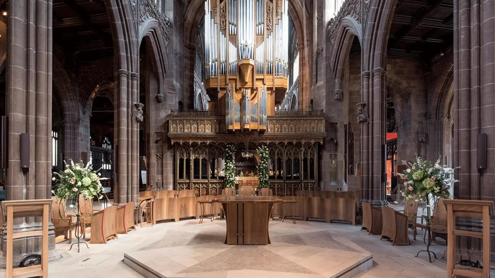 Manchester Cathedral Visitor Guide Banner featuring the cathedral interior