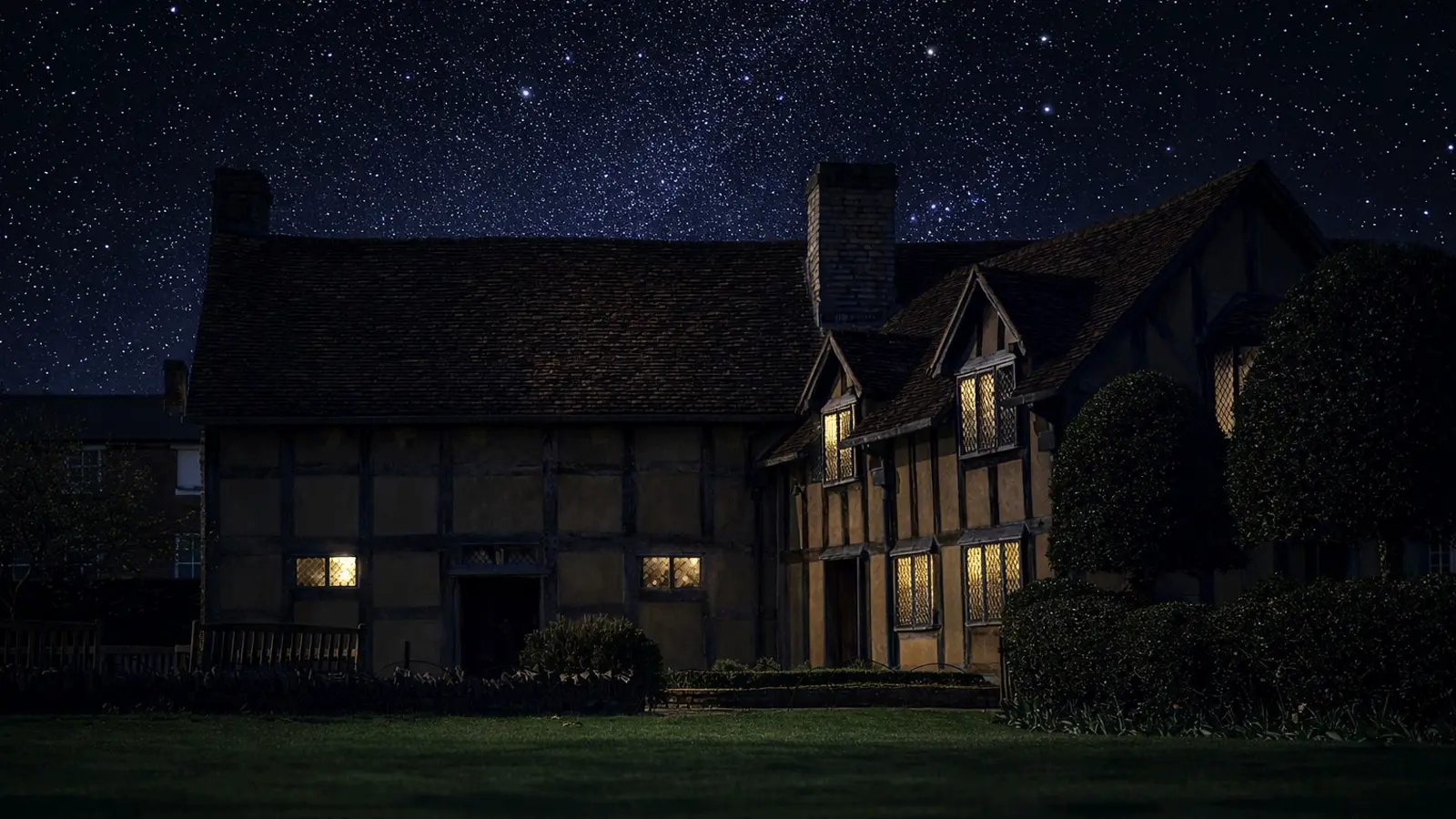 Shakespeare's Birthplace Visitor Guide Banner featuring the historic Tudor house